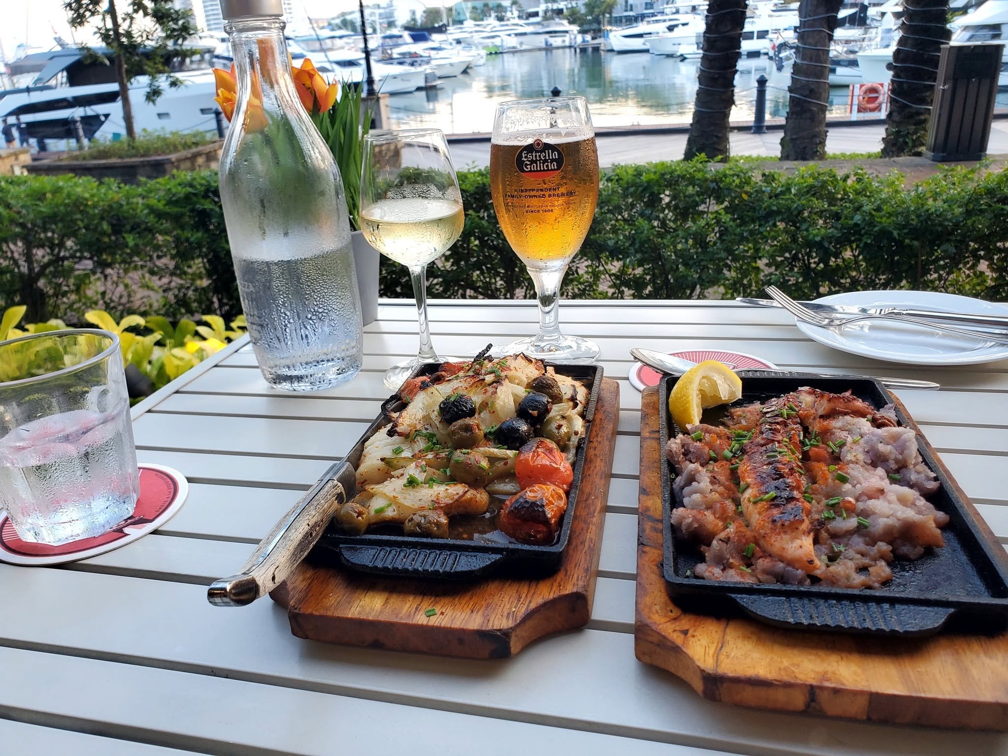 Waterfront dining — grilled seafood and cold beer, Singapore
